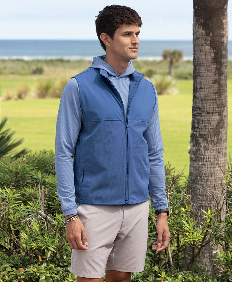 Male model wearing Peter Millar Flow Vest