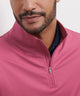 Pink quarter-zip terry pullover close-up of zipper and mock collar placket