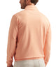 Peach stretch quarter-zip pullover, back view with stand collar and long sleeves.