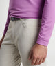 Lilac quarter-zip pullover sleeve and hem detail over light pants