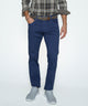 Dark blue stretch denim jeans with belt loops, button fly, and five-pocket styling.