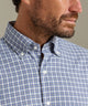 Blue plaid performance flannel shirt collar and button placket close-up