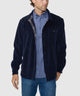 Navy knit corded shirt jacket worn by model, button front and chest pocket