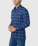 Navy blue plaid stretch button-down long-sleeve sport shirt, side view on model