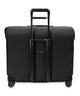 Black rolling wardrobe spinner suitcase back view with telescoping handle and wheelbase